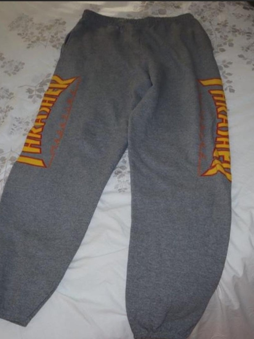 Thrasher Gray Sweatpants with Yellow and Orange Logo